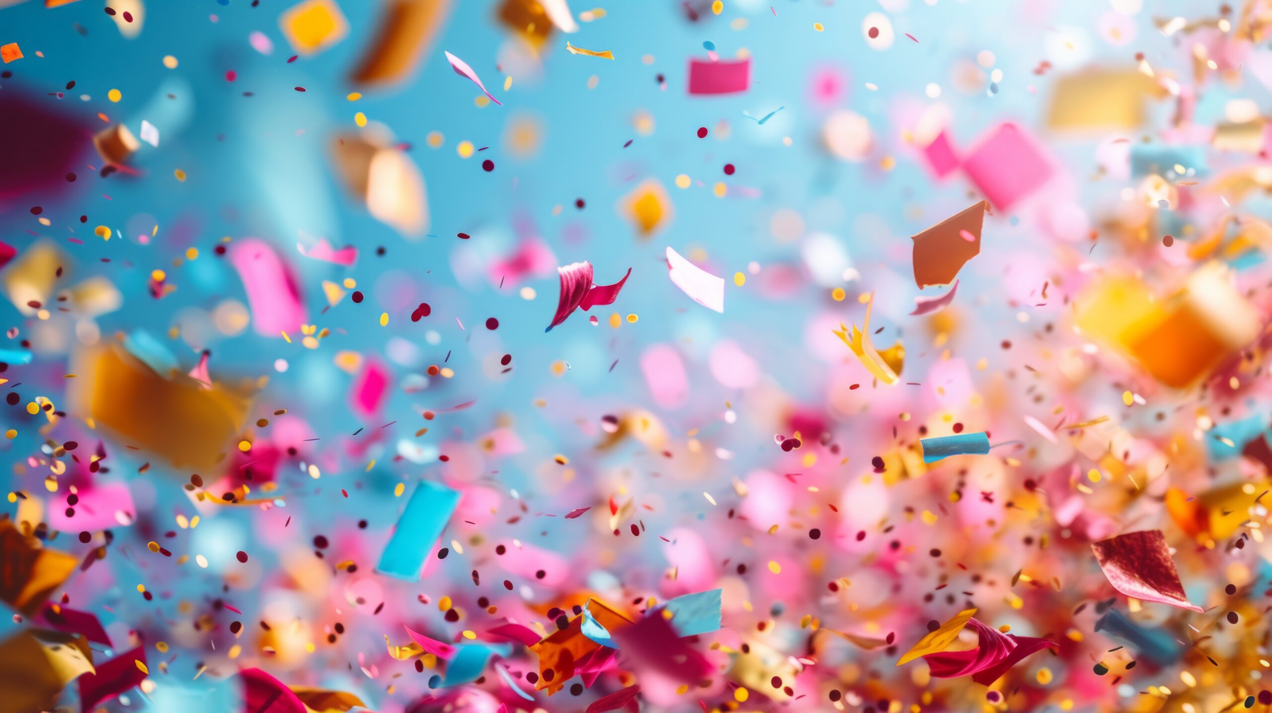 Colorful confetti adorns a bright background, evoking a sense of celebration and joy.